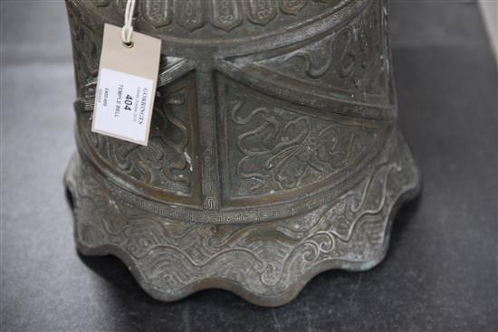 A Chinese bronze temple bell, Qing dynasty, 36cm